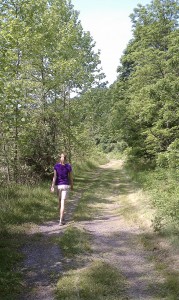 Janie hiking on wide Lake Trail